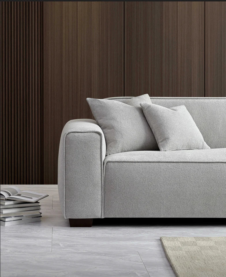 The Alaric 4 Seater Chaise Sofa in Pebble Boucle