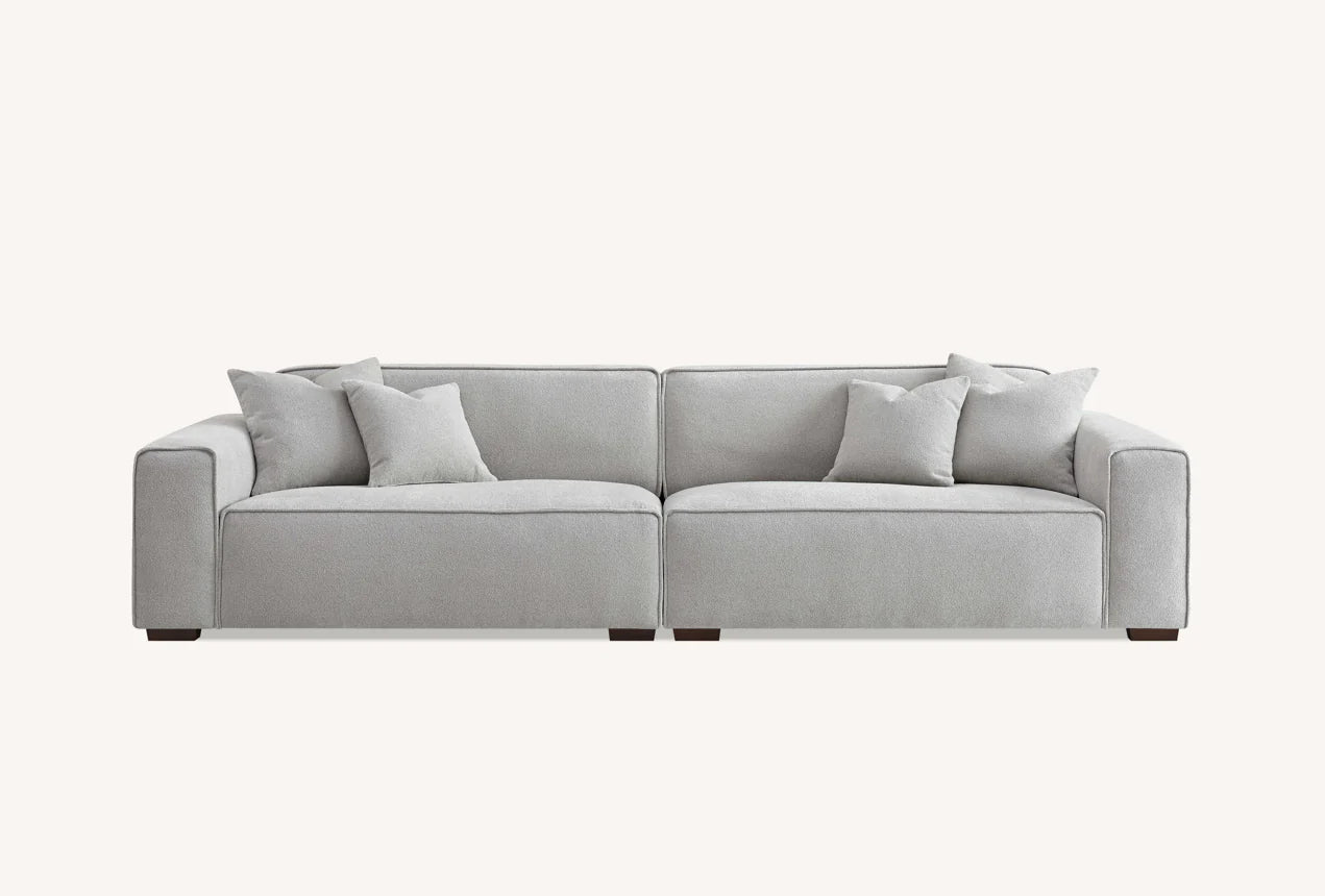 The Alaric 4 Seater Chaise Sofa in Pebble Boucle