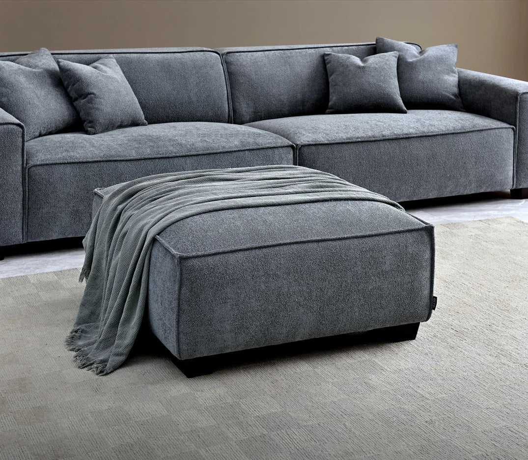 The Alaric 4 Seater Chaise Sofa in Charcoal Boucle