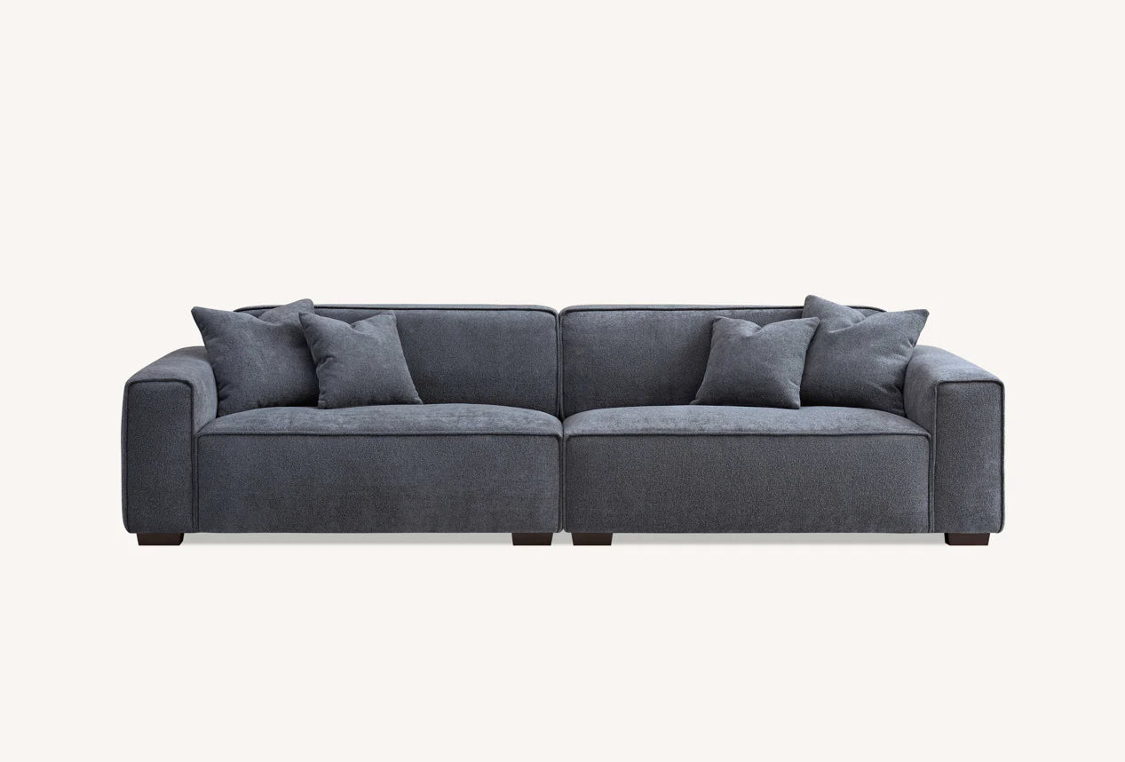 The Alaric 4 Seater Chaise Sofa in Charcoal Boucle