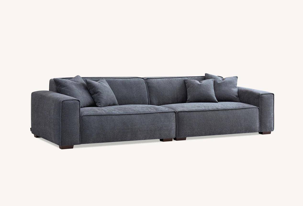 The Alaric 4 Seater Chaise Sofa in Charcoal Boucle