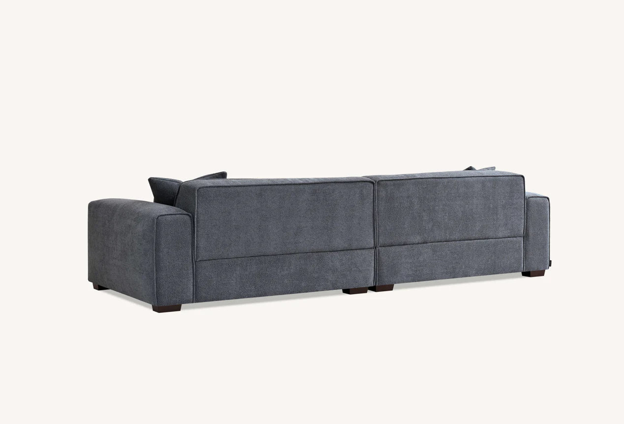 The Alaric 4 Seater Chaise Sofa in Charcoal Boucle
