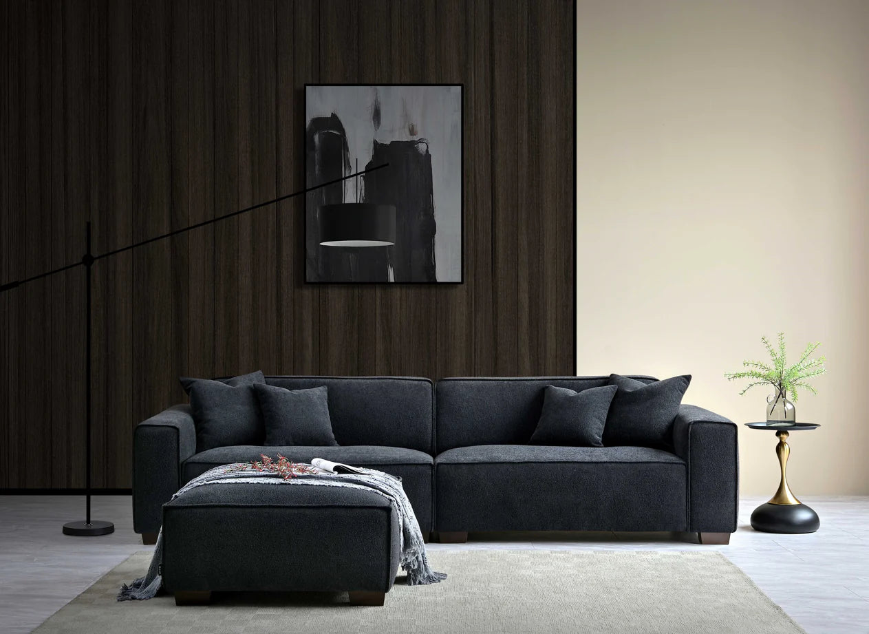 The Alaric 4 Seater Chaise Sofa in Mignight Boucle