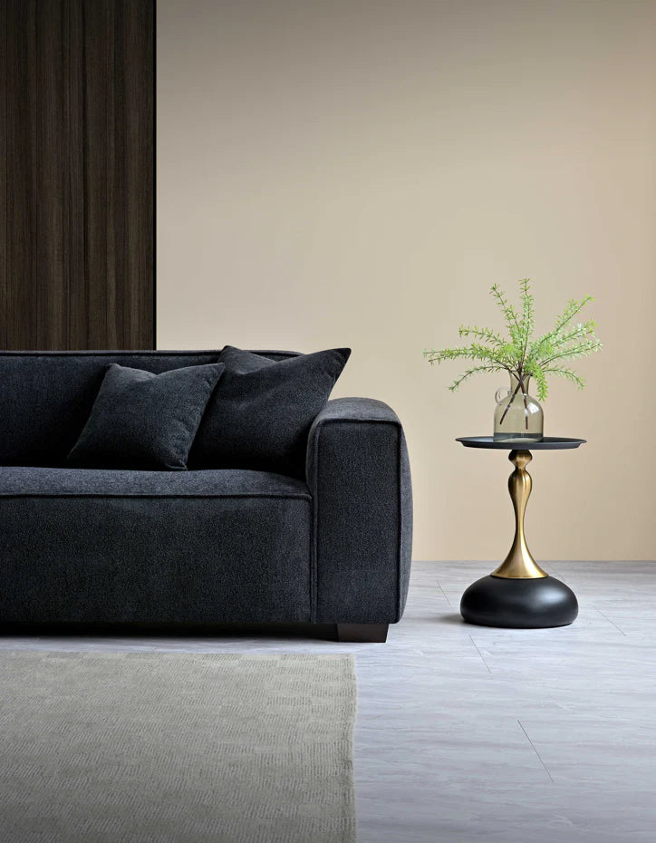 The Alaric 4 Seater Chaise Sofa in Mignight Boucle
