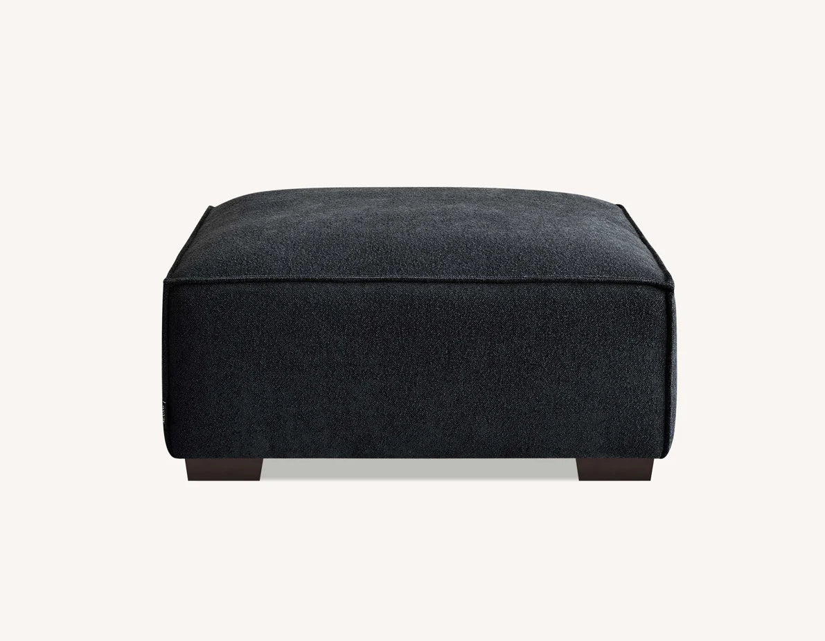 The Alaric 4 Seater Chaise Sofa in Mignight Boucle