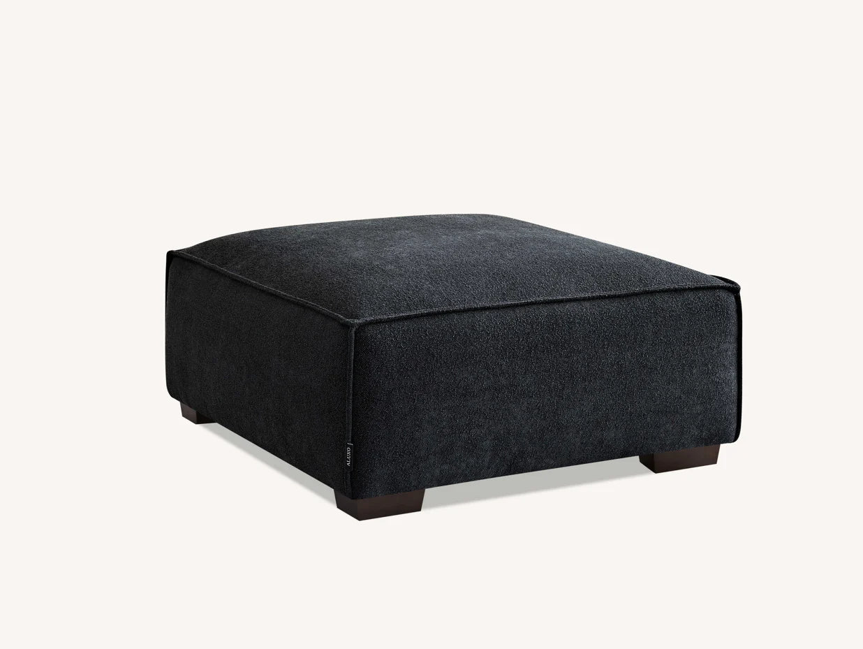 The Alaric 4 Seater Chaise Sofa in Mignight Boucle