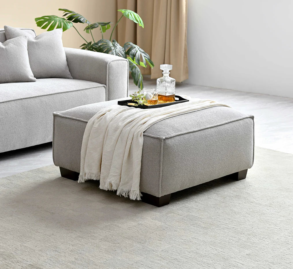 The Alaric 4 Seater Chaise Sofa in Pebble Boucle